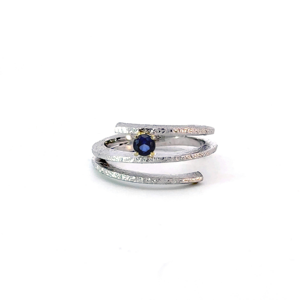 Silver, gold and sapphire ring