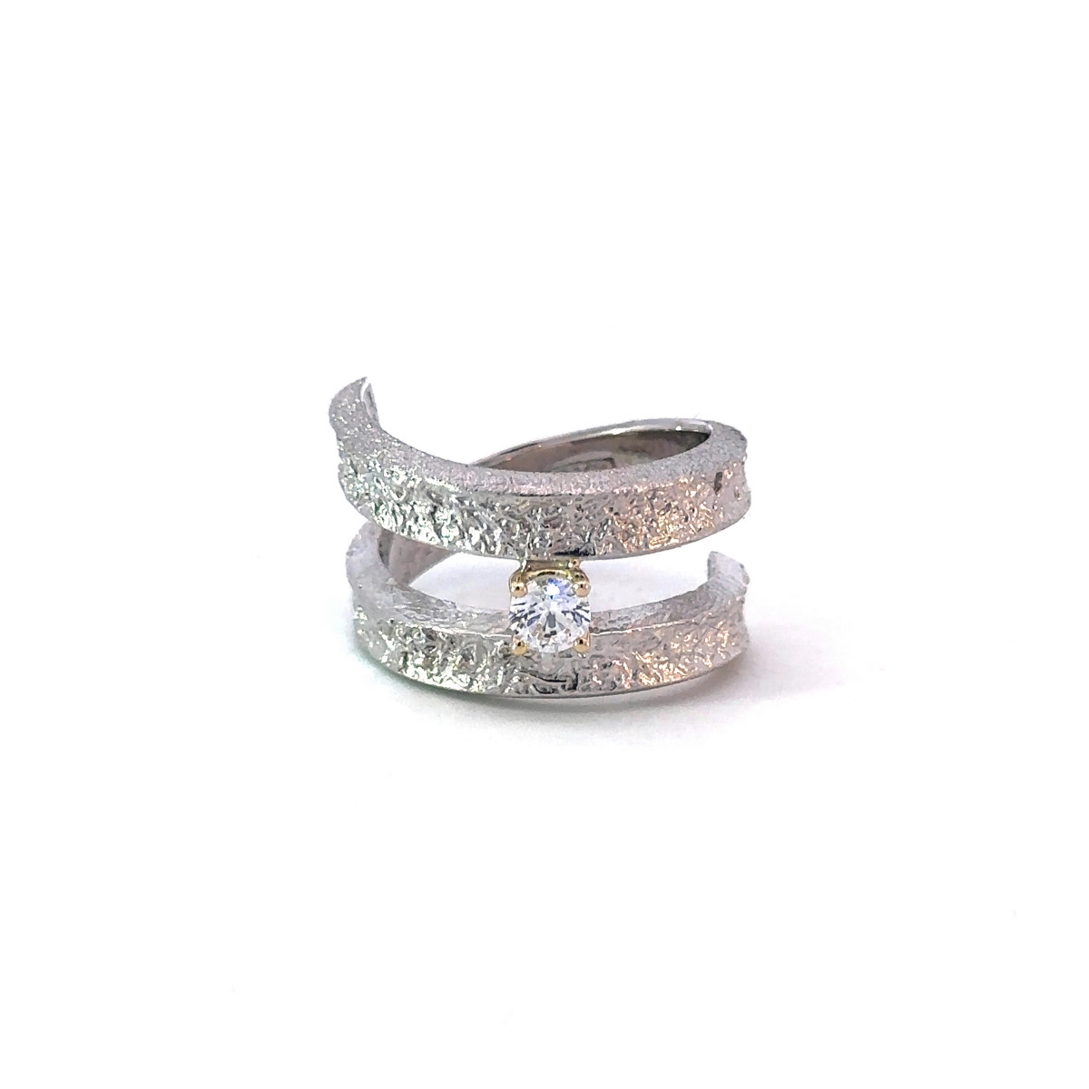 Silver, gold and brilliant ring